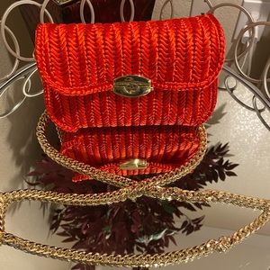 Here shows a beautiful red handmade purse